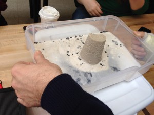 Testing using a building made from sand